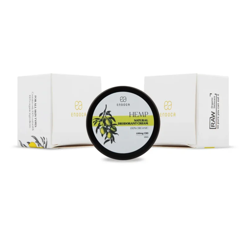 Deodorant cremă natural cu CBD 100mg de la Endoca, prezentat cu borcanul și cutia albă decorată cu ilustrație de lămâi verzi.